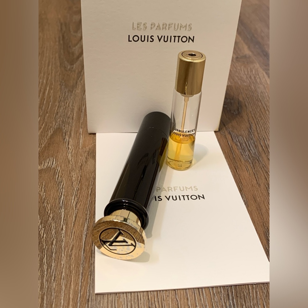 SOLD!!!!   Louis Vuitton travel atomizer + Turbulences 1/3 full